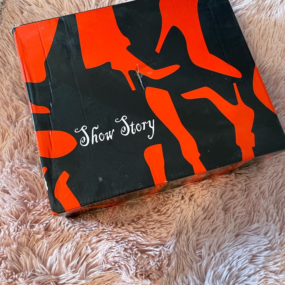 Red and Black super spiked platform shoes.